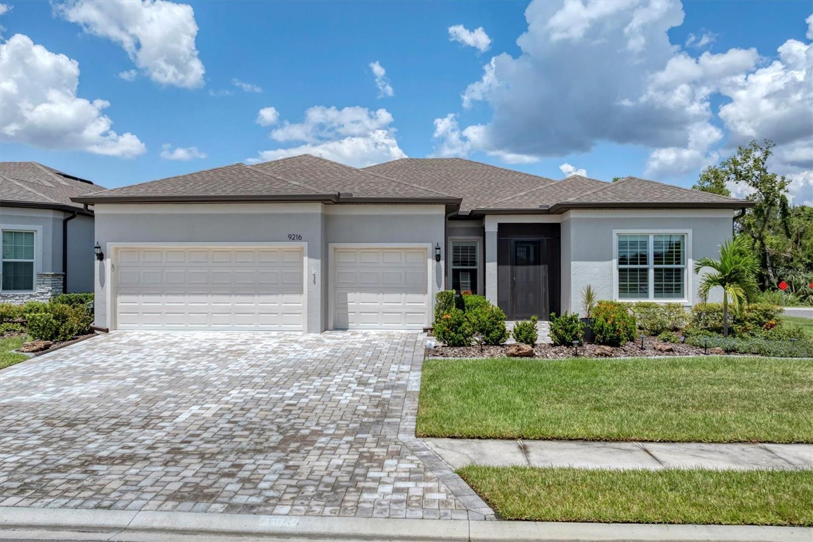 Craving a highly active lifestyle community and a private homesite to call home? This Stellar floorplan offers all that and more. A corner lot with big conservation behind; sellers have added significant landscaping, widened the front walkway (you will notice the difference) screened in the entry and extended the now paver lanai. The lanai is pre-plumbed for an outdoor kitchen and has a remote-controlled hurricane screen. Inside, NO carpeting- only Luxury vinyl plank flooring you will love. The Stellar presents three bedrooms, three baths, a large den with doors, an inside laundry and three car garage. The kitchen has TWO KitchenAid ovens and a new Thermador cooktop. The wine refrigerator and home refrigerator are Café series also. The walk-in pantry is functionally finished. One guest room is ensuite providing a welcoming retreat for friends and family. Primary bath has custom mirrors over the large double sink vanity; the water closet has been pre-wired for a bidet. Located near the Driftwood Club amenity center for easy access to all the lifestyle the community has to offer. Golf cart friendly and with a restaurant on site; Del Webb Bay View is a 55+ highly active community. Close to I-75 and 275 with convenience to a myriad of cultural, music and beach attractions. CDD is included in the taxes shown.