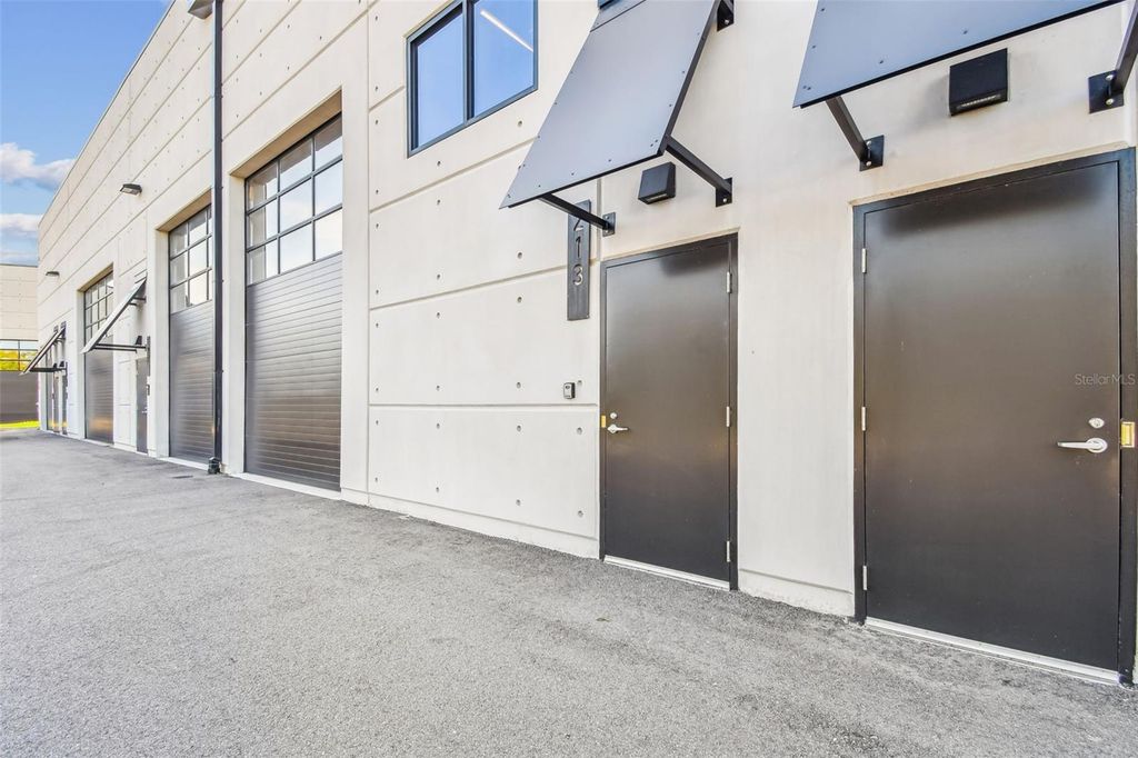 Photo of 6500 Motor Enclave Way #213, Tampa, FL 33610 (MLS # TB8455020)