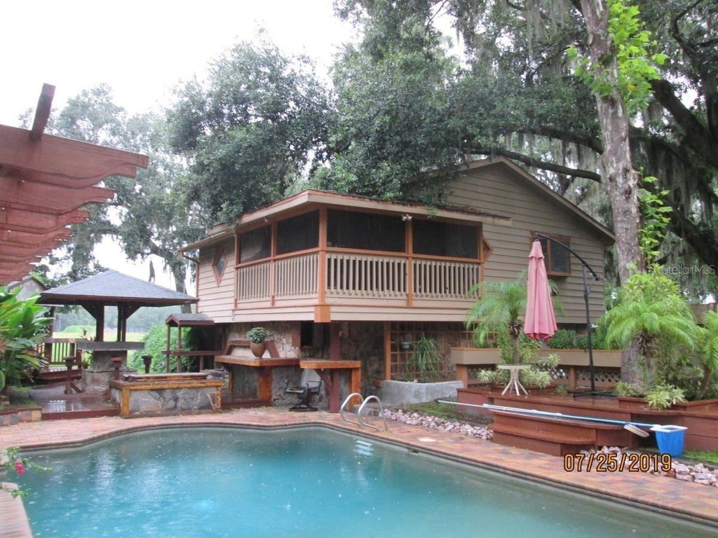 Photo of 2690 E Lake Road, Kissimmee, FL 34744 (MLS # O6420498)