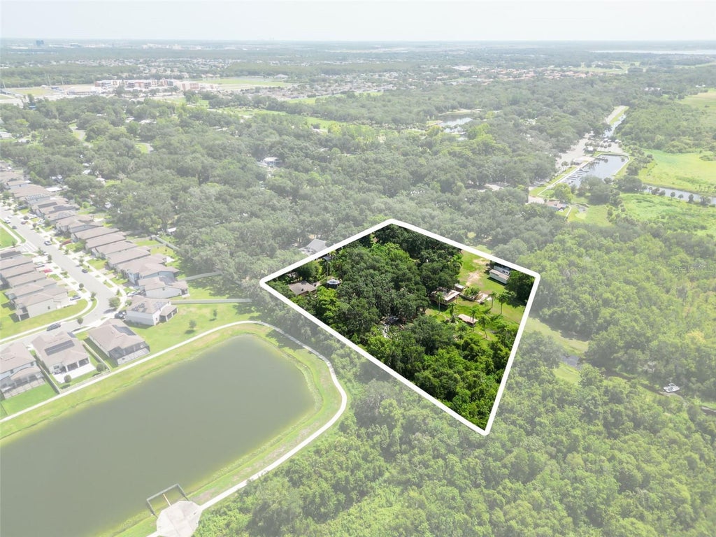 Photo of 2690 E Lake Road, Kissimmee, FL 34744 (MLS # O6420498)