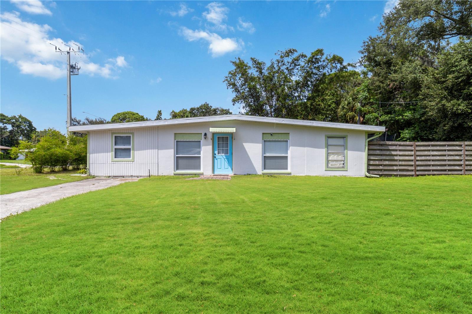 One or more photo(s) has been virtually staged. A super central Sarasota location close to it all! This is a larger and fenced lot home with a detached 2-car garage. Inside is a separate living room, office, and family room with a central opened kitchen. The updated kitchen features new cabinets and countertops, some newer appliances, and new lighting. The bathroom has an updated shower and vanity and the home has new luxury vinyl throughout. There are four super-efficient mini-split A/C systems that cool the home. Dual driveways allow for extra parking and toy storage along with the 2-car garage. This home is completely ready to go with all the inside updates taken care of! Ready for a new owner to enjoy the updating as well as the great proximity of this home near to I-75 (~4 minute drive), downtown Sarasota (~9 minutes), Siesta Key (~12 minutes), and close to restaurants, hospital, doctors, shopping, and so much more!