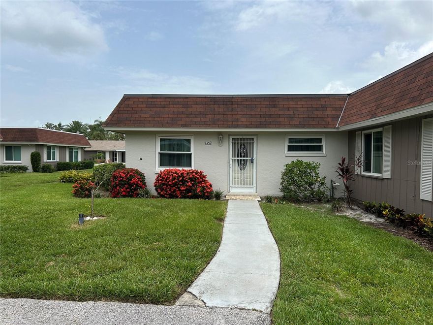 Your vacation rental is ready for you. This two bedroom Villa is located in the desirable and active 55 plus community of Forest Pines. Updated throughout with granite counters in kitchen and baths, spa like showers in both bathrooms, tile plank flooring through out the unit, A lovely updated Florida room with greenbelt views which is perfect for your morning cup of coffee. Forest Pines offers , a heated community pool, club house, exercise room and community activities. Located close to the Amish restaurant's and fresh produce off of Bahia Vista. Not far from downtown, Siesta Key, shopping, museums, and theater. This owner would consider a long-term, short term or a prime season rental Jan thru April at $3200 a month plus tax.
