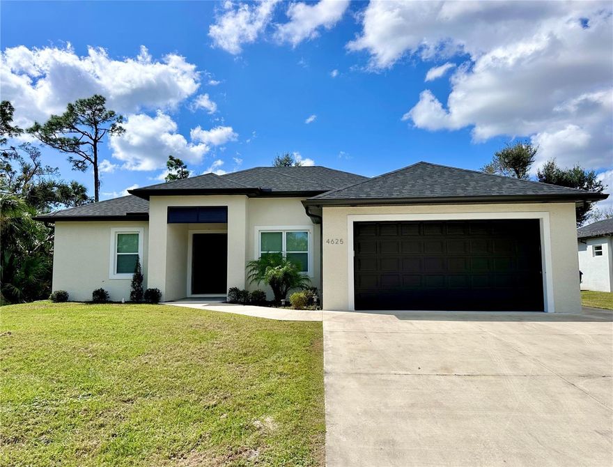 Welcome to this precisely built home with over 2,640 square feet of thoughtfully designed living space. Featuring 3 bedrooms, a versatile office/flex room, 2 bathrooms, and a 2-car garage, this residence perfectly blends comfort and modern style. Ideally located in the cozy area of North Port yet close to Port Charlotte near everyday essentials. Step inside through a welcoming foyer that opens into a spacious great room, three-panel sliding glass doors fill the space with natural light, complementing the high ceilings and contemporary design. Enhanced recessed lighting in the great room, kitchen, all the bedrooms and office adds warmth and sophistication. The gourmet custom kitchen is a true centerpiece, showcasing quartz countertops, a large island, soft-close cabinetry, and tile backsplash, professional-grade appliances, and pantry. The adjoining dining area overlooks the serene backyard—perfect for enjoying your morning coffee. The primary suite offers a relaxing retreat, featuring sliding glass doors, a tray ceiling with recessed lighting, and a ceiling fan for added comfort. The luxurious en-suite bath includes dual vanities, elegant tile finishes, a spacious walk-in shower, and two walk-in closets. Comfortable guest bedrooms equipped with ceiling fans providing cool and relaxing space for visitors. The flexible office space can easily be converted into a fourth bedroom to suit your needs. WHOLE HOUSE R/O SYSTEM providing high quality water right form the tap. Throughout the home, you’ll find a light and airy ambiance paired with modern finishes and design. Additional highlights include HURRICANE IMPACT WINDOWS AND DOORS, an interior laundry room with plenty of extra space/storage. No HOA or CDD fees. Enjoy outdoor living under the covered patio overlooking a spacious backyard with plenty of room to add a future pool. With its smart layout, upscale features, and unbeatable location, this home is truly a must-see.