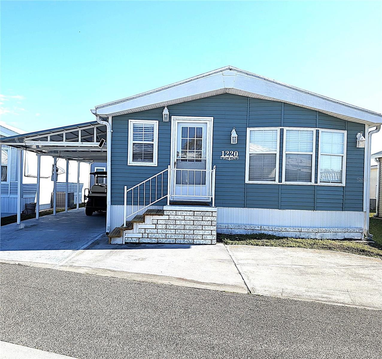 Check out one of the few true double-wides in this park! Over 900 sf of living space. This beautifully decorated home comes furnished with all furniture. 3 bedrooms and 1 1/2 baths makes this home ideal for friends and family to come and visit. The large dining and living area make it easy to host those extra guests. This community features 2 pools, a hot tub, newly renovated fitness center, billiards, tennis courts and shuffle board with an active schedule for all of the 55+ residents. You do not want to miss this one!