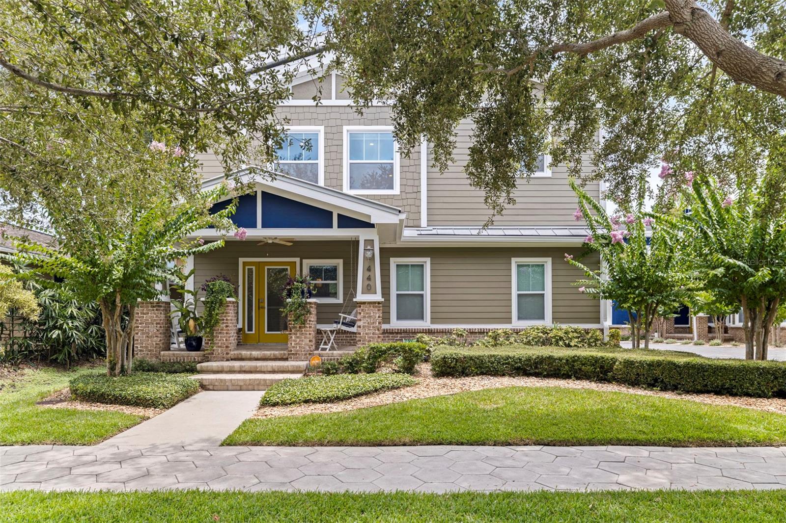 Located in the highly sought-after Historic Old Northeast neighborhood in a NON-FLOOD ZONE this impeccably designed 2-bedroom and den/bonus room, 2.5-bath townhome, built in 2017, offers the perfect blend of classic charm and modern convenience. With 2,096 sq ft of thoughtfully designed space, this two-story masonry block construction townhome is positioned at the front of a boutique 8-unit community, offering a single-family home feel with a large front porch featuring a charming swing and a private, cozy backyard ideal for outdoor entertaining or grilling. Just a 10-minute walk and six blocks from vibrant downtown, this home is in the perfect location. The open-concept first floor is designed for both everyday living and entertaining, featuring a spacious dining room and a beautifully appointed kitchen with custom soft-close solid wood cabinetry, quartz countertops, a stylish backsplash, and stainless steel appliances with natural gas range. The living room effortlessly transitions into the kitchen and overlooks French doors that lead to the private backyard. An oversized 2-car garage is seamlessly integrated into the home, offering easy access. Completing this level is a well-designed half-bath. Upstairs, you’ll find a spacious family room, a private laundry room, and a generously sized guest bedroom with an en-suite bathroom. The primary bedroom is a true retreat, complete with a large walk-in closet and a spa-like en-suite bathroom featuring an oversized frameless glass shower and premium fixtures. This home is loaded with thoughtful upgrades, including a new HVAC system (2024), wood flooring throughout, crown molding, custom blinds, hurricane-impact windows and doors, built-in closet systems, a built-in Murphy bed, ceiling fans in every room, and lush landscaping in the backyard. The entire home is equipped with a whole-house water filtration system, ensuring the utmost comfort and convenience. Located just moments from the vibrant downtown area, with its eclectic shops, acclaimed restaurants, and picturesque Tampa Bay waterfront, this move-in-ready townhome offers the ultimate in comfort, style, and location. Experience Florida living at its finest—schedule your private showing today!