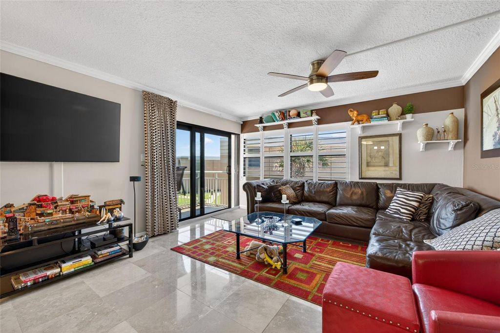 Photo of 4811 Saxon Drive #A-203, New Smyrna Beach, FL 32169 (MLS # NS1088219)