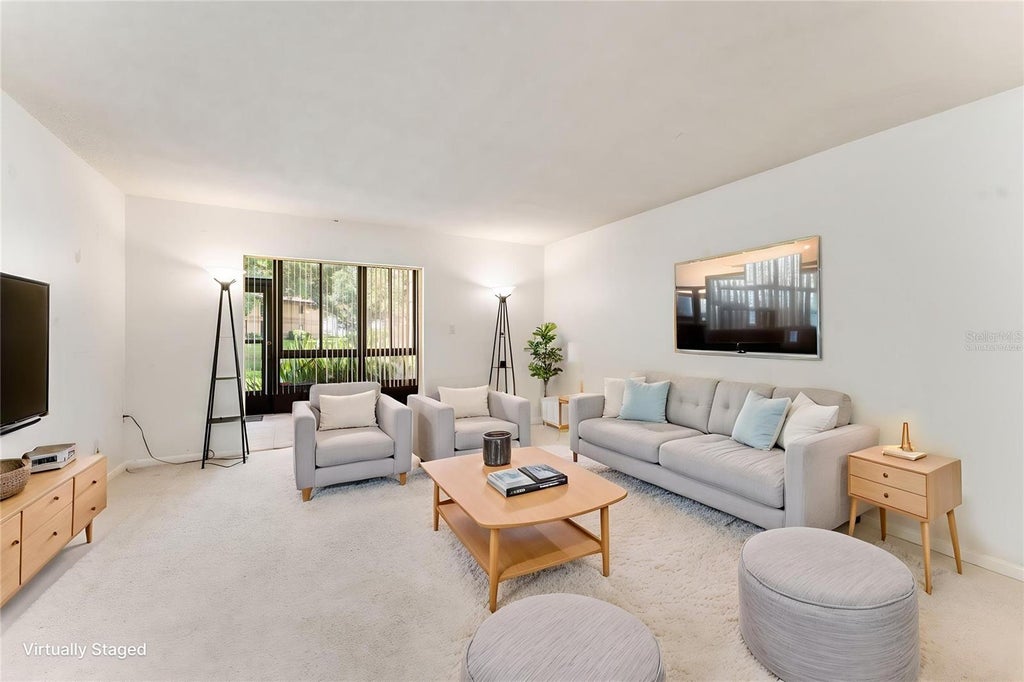 Photo of 2689 Sabal Springs Circle #102, Clearwater, FL 33761 (MLS # TB8549012)