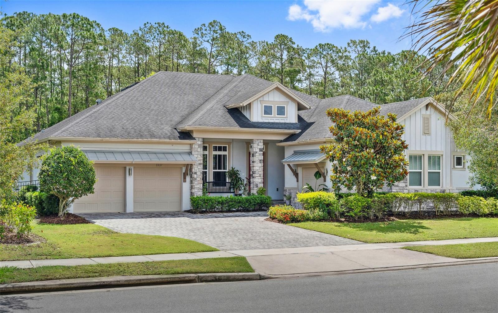 Very Rare Estate home with CONSERVATION VIEWS in Lake Nona’s premier community of Laureate Park. With 4 bedrooms, 4.5 bathrooms, an office, and a versatile flex space/playroom, this thoughtfully designed home is tailor-made for both relaxing and entertaining. At the entrance, a foyer and office greet you. The heart of this open concept floor plan is the gourmet kitchen, featuring sleek stone countertops, modern hardware, stainless steel appliances, built-in ovens, ample cabinetry, pantry, upgraded flooring throughout and an oversized island with views of the large backyard and conservation. The open-concept floor plan seamlessly connects the kitchen, dining area, and living room, making it perfect for year-round entertaining. The primary suite will not disappoint with nature views, a trayed ceiling, spa-like bathroom with a large frameless shower and extended walk-in closet with built-ins. All additional bedrooms are generously sized, perfect for family or guests, while the versatile flex room offers the ideal space for a playroom or second living area. Step outside to experience your beautiful OUTDOOR OASIS complete with extended lanai, triple sliding glass doors, and an extended fenced-in private backyard that is the ideal space to enjoy time with family and friends. Must see in person to fully appreciate every detail of this immaculate home. Additional notable features: epoxy floored 3-car garage, Solar, Tankless Water heater, and whole home water filtration system. Situated in Laureate Park, this family-friendly community offers a harmonious blend of natural beauty and modern amenities. Enjoy the aquatic center with its 3 pools, or engage in outdoor fun at the tennis and basketball courts, pocket parks, and scenic walking trails. For those who love technology, Laureate Park includes Gigabit Fiber Internet to every home. Located near the vibrant Lake Nona Town Center and top-tier Medical City, this neighborhood is close to countless shopping and dining options including the extraordinary Lake Nona West shopping complex coming in early 2026. This extraordinary residence is a rare opportunity; arrange your exclusive showing today!