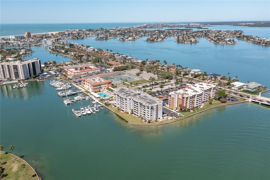 TREASURE ISLAND 3-BEDROOM, 2-BATHROOMS, 1-HALF BATH CORNER UNIT CONDO LOCATED IN THE TREASURE ISLAND YACHT AND TENNIS CLUB. Amazing find! Excellent opportunity for the savvy buyer! Prime corner unit with large rooms and an open floor plan.  Sold fully furnished and move-in ready! Full-size washer and dryer in unit. Western-facing balcony to enjoy sunsets every night.  Electric storm shutters on all windows and balconies for added protection. Beach living can be yours! Lease purchase available.