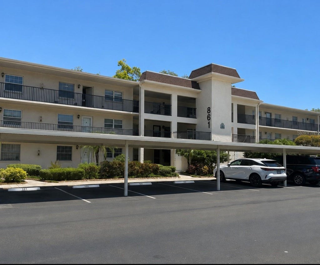 Photo of 861 Maple Court #104, Dunedin, FL 34698 (MLS # TB8531968)