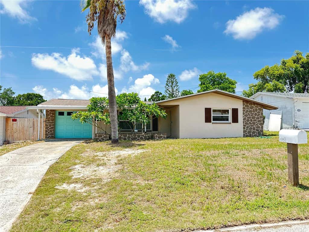 Photo of 3313 Briar Cliff Drive, Holiday, FL 34691 (MLS # TB8534129)