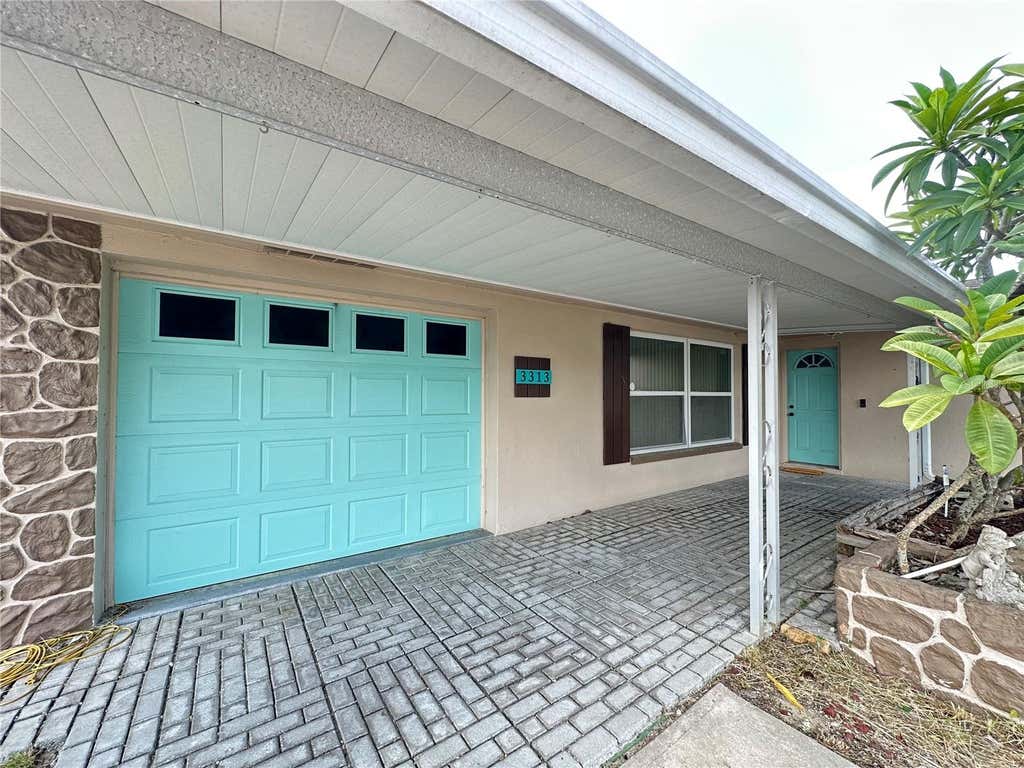 Photo of 3313 Briar Cliff Drive, Holiday, FL 34691 (MLS # TB8534129)