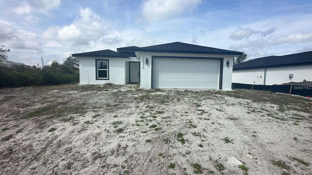 Photo of 12266 Edwards Road, Port Charlotte, FL 33981 (MLS # TB8491186)