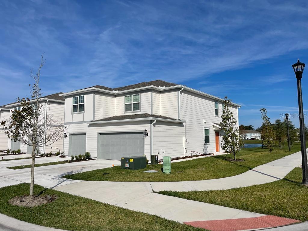 Stunning 3 beds/2.5 bath/2car garages townhome with WATER VIEW. UPGRADED SCREEN PORCH. Ready to move-in on November 10th at Grayson Square, Winter park. RENT INCLUDES high-speed 1GB fiber optic internet & 75 streaming cable and music channels. The first floor is efficiently laid out with the kitchen, powder room, and spacious gathering room perfect for entertaining with a sliding glass door that opens to the covered lanai and patio that overlooks a pond. Corner unit that offers more privacy and open outdoor space. Enjoy indoor/outdoor entertaining in your new home. Well-appointed kitchen with top-of-the-line stainless steel appliances and a large quartz countertop. Ample storage throughout. Upstairs you will find a master suite with a spacious walk-in closet. Luxurious ensuite bathroom with glass-door shower and quartz countertop and double sinks. 2 additional bedrooms and a laundry closet with a newer washer and dryer. Grayson Squares offers: Community Pool with Cabana, Zoned for Seminole County Schools, Gated Entry, Near Major Roadways Providing Easy Daily Commutes, Minutes to Shopping and Dining Options on Park Ave. in Downtown Winter Park, 3 Miles to SR 417, 20 Minutes to Downtown Orlando and Orlando Area Attractions. Welcome Home! Equal Housing Opportunity.