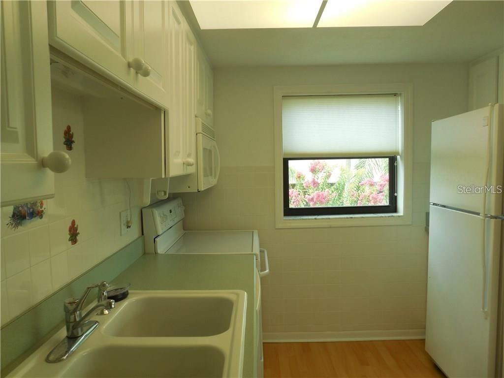 Photo of 1 Windrush Boulevard #28, Indian Rocks Beach, FL 33785 (MLS # TB8415786)