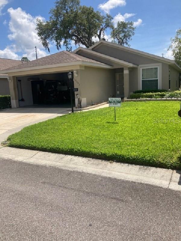 Photo of 10007 Brookdale Drive, New Port Richey, FL 34655 (MLS # TB8519922)