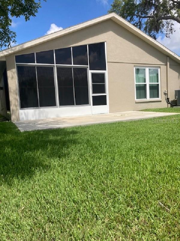 Photo of 10007 Brookdale Drive, New Port Richey, FL 34655 (MLS # TB8519922)