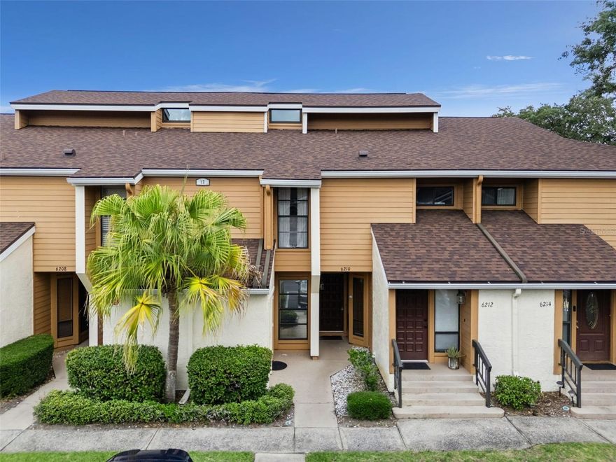 Welcome to the vibrant lifestyle of Florida within the secure, gated community of Ventura Golf and Country Club, where exceptional amenities abound. This inviting apartment is ideally situated just a short walk from Raintree’s resort-style heated pool and spa, and only five minutes from Ventura’s expansive 10,000-square-foot clubhouse. Here, you can relax at the 19th hole bar or enjoy a delightful meal on the balcony while taking in the stunning views of the golf course, Olympic-sized pool, and practice green.

The community offers a wealth of recreational activities, including tennis, pickleball, bocce ball, shuffleboard, a playground, a library, and a fitness center. For those who love the outdoors, there are scenic trails for walking or biking, along with the opportunity to fish or grill at the tranquil beach area of Lake Fredrica.

Step inside the apartment, where the foyer gracefully leads into the dining and living areas, featuring newly updated luxury vinyl plank flooring and baseboards. The wet bar area has been thoughtfully renovated, showcasing handcrafted solid oak cabinet doors, granite countertops with a travertine backsplash, and floating oak shelves—perfect for a coffee bar or serving drinks.

The kitchen also boasts beautifully handcrafted solid oak cabinets, granite countertops, and a travertine backsplash. A washer and dryer are conveniently located in a closet off the kitchen. You’ll find travertine flooring in all wet areas, as well as in the double-glazed sunroom, which can be air-conditioned for your comfort. Recent upgrades include a new HVAC system, and the HOA has replaced all the roofs as of 2025. In the coming year or two, all buildings in Raintree will receive a fresh coat of exterior paint.

The seamless flow of the flooring continues into the primary bedroom, where the bathroom has been beautifully remodeled with a marble and travertine walk-in shower featuring frameless glass doors. The vanity has been updated with new cabinets and a granite countertop. The second bedroom and guest bathroom, located at the front of the apartment, are perfect for hosting visitors.

Ventura Golf and Country Club is conveniently located just five miles north of the International Airport and close to downtown Orlando, where you can explore the Dr. Phillips Center for Performing Arts or catch a basketball game at the Kia Center. With easy access to the 528, you can head west to world-class attractions, Tampa, and the Gulf beaches, or east to Florida’s stunning Space Coast beaches.

Don’t miss this opportunity to claim your slice of paradise. Whether you’re seeking a primary residence, a seasonal retreat from the cold winters, or an investment property, Ventura Golf and Country Club offers it all. Notably, Raintree is one of the few locations in Orlando that permits short-term rentals.

This apartment is vacant and easy to show—schedule your visit today before it’s too late!