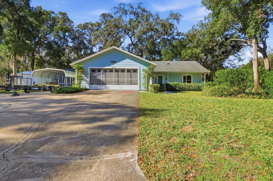 Welcome to 35003 Silver Oak Drive in beautiful Leesburg — a wonderfully updated 3-bedroom, 2-bath home offering comfort, functionality, and Florida living at its finest!   Located on a corner lot giving that "country feel" but close to everything: shopping, restaurants, medical facilities and so much more.  NO HOA and NO CDD!!!  
Step inside to an inviting open floor plan highlighted by volume ceilings, fresh interior paint (including ceilings), and brand-new carpet in all bedrooms. The airy Kitchen features an eat-in area, breakfast bar, and a solar tube for added natural light. A second solar tube enhances the guest bath.  The Kitchen also includes all your appliances!
The split bedroom plan gives privacy to all!  The spacious Primary En Suite includes a new vanity with dual sinks, new toilet and plenty of storage. The large Primary Bedroom includes a walk-in closet ceiling fan, new carpeting and sliders to the lanai.  Both generously sized guest bedrooms include ceiling fans, closets, and new carpeting. 
The Dining Room and Living Room have beautiful luxury vinyl plank flooring and include sliders to the enclosed Lanai
Enjoy peace of mind with a whole-home generator, all replaced windows, and a NEW ROOF being installed!
Outdoor living truly shines here! Relax on the open front porch to sip your morning coffee, or the enclosed lanai with vinyl windows and screens,  Take a refreshing dip in the in-ground pool with birdcage!  Storage and parking are abundant with an oversized two-car garage (which also includes screened garage sliders), carport, and two separate storage sheds.  Perfect for boat parking and extra storage space!
This well-maintained home offers a blend of thoughtful updates, generous space, and resort-style amenities—perfect for year-round enjoyment. Don’t miss your opportunity to make this beautiful property your next home!