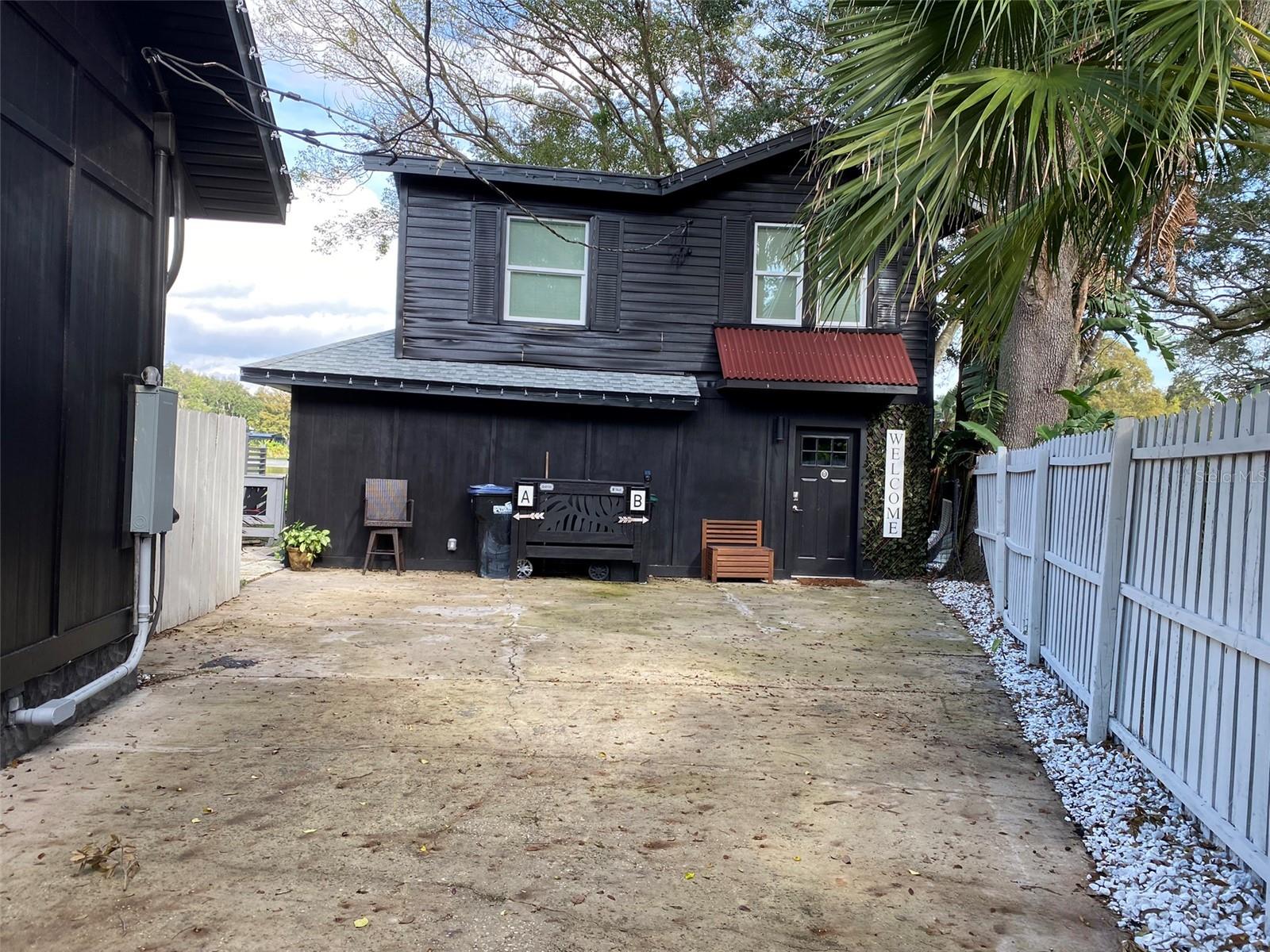LAKEFRONT LIVING IN THE HIGHLY SOUGHT AFTER HOURGLASS DISTRICT!! 2 BEDROOMS AND 2 FULL BATHS. GRANITE COUNTER-TOPS, STAINLESS-STEEL APPLIANCES AND DESIGNER DETAILS. YOU FORGET YOU ARE LOCATED IN THE HEART OF THE CITY AS YOU ENJOY THE WILDLIFE WITH INCREDIBLE VIEWS. LOCATED NEAR I4, BOONE HIGH SCHOOL, SHOPPING CENTERS, AND ORLANDO'S WORLD CLASS ATTRACTIONS. There are two houses on the property. This listing is for the back House. It has a private back yard and all the privacy of a single family house. It was rented out as two air b and b units with two entrances. It is available furnished and includes lawn maintenance but no utilities. It has its own meter.