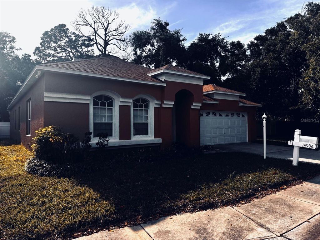 Photo of 14996 Hidden Oaks Circle, Clearwater, FL 33764 (MLS # TB8499723)