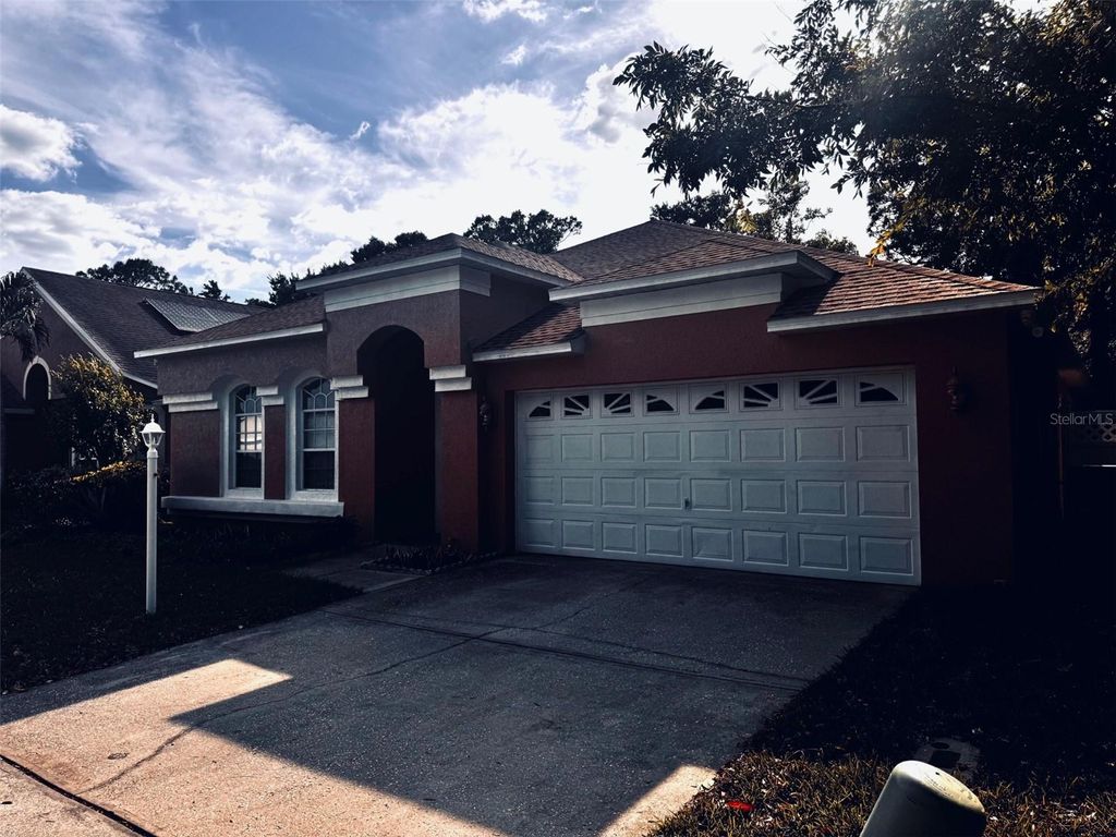 Photo of 14996 Hidden Oaks Circle, Clearwater, FL 33764 (MLS # TB8499723)