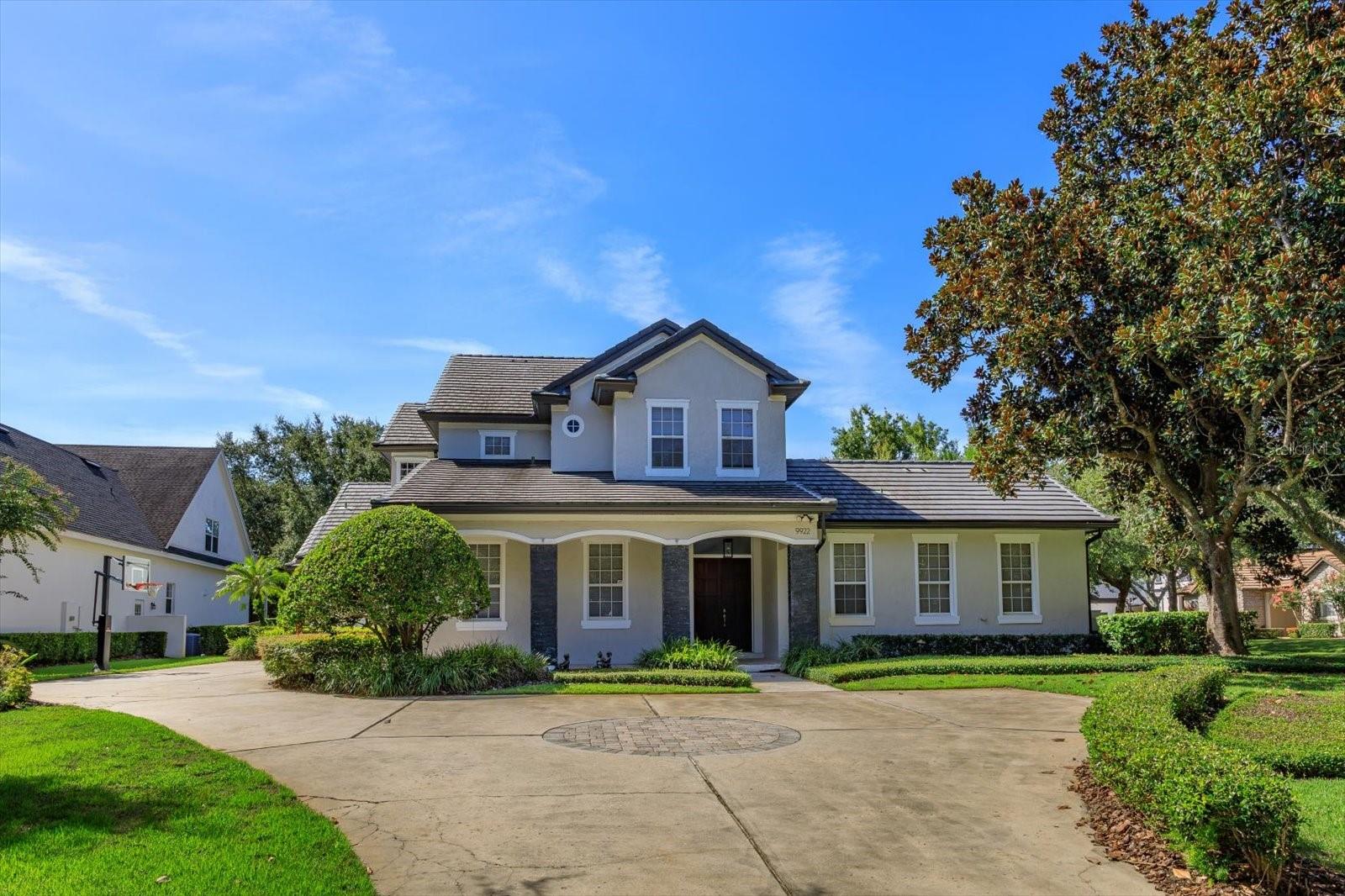 If you want something turn-key in Keene’s Pointe, sitting in one of the most desirable locations in the community, then look no further. This is a home you can move into today, sit down and live, without touching a single thing. This home has not only been renovated from end to end, but also has a three year old new tile roof!! Every square inch of the house feels brand new as you walk thru. It has one of the most flexible floorpans in the entire community - including a fully detached in-law suite - a rarity found in homes today. It has 6 bedrooms, but can also be set up as a 5 bedroom with an office, or a 4 bedroom with an office and huge enclosed bonus. And with the detached in-law suite, it is flexible in ways almost no other home can be. There are almost no lifestyle needs this home will not fit. A relaxing backyard outdoor living is everything Florida is all about. This home has an incredible screened in courtyard pool and spa alongside a summer kitchen, covered patio seating, outdoor televisions, drink fridge, and even a pizza oven. And the backyard is like an oasis. Incredibly spacious, completely private, and fenced, brand new stand alone spa, and amazing turf lawn. Within the house we have a brand new kitchen with new appliances, beautiful wine room, new bathrooms, new flooring, new lighting and plumbing fixtures - the list goes on and on. It is located in the world renowned community of Keene’s Pointe with the Golden Bear Club, on a corner culdesac lot, and one block walking distance to the club! So again, if you want a home you can move into today and live without touching anything this is it. There is nothing like it available in Windermere. Call for your private showing today.
