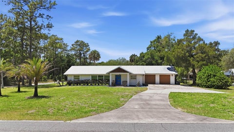 Photo of 37237 Grays Airport Road, Lady Lake, FL 32159 (MLS # G5111836)
