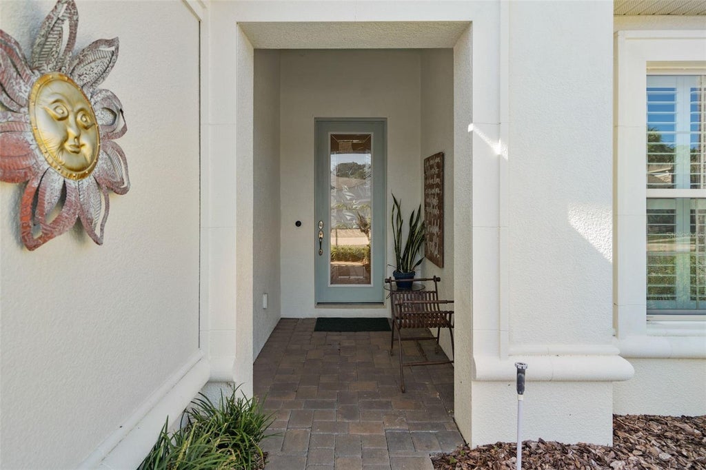 Photo of 1038 Timbervale Trail, Clermont, FL 34715 (MLS # O6448989)