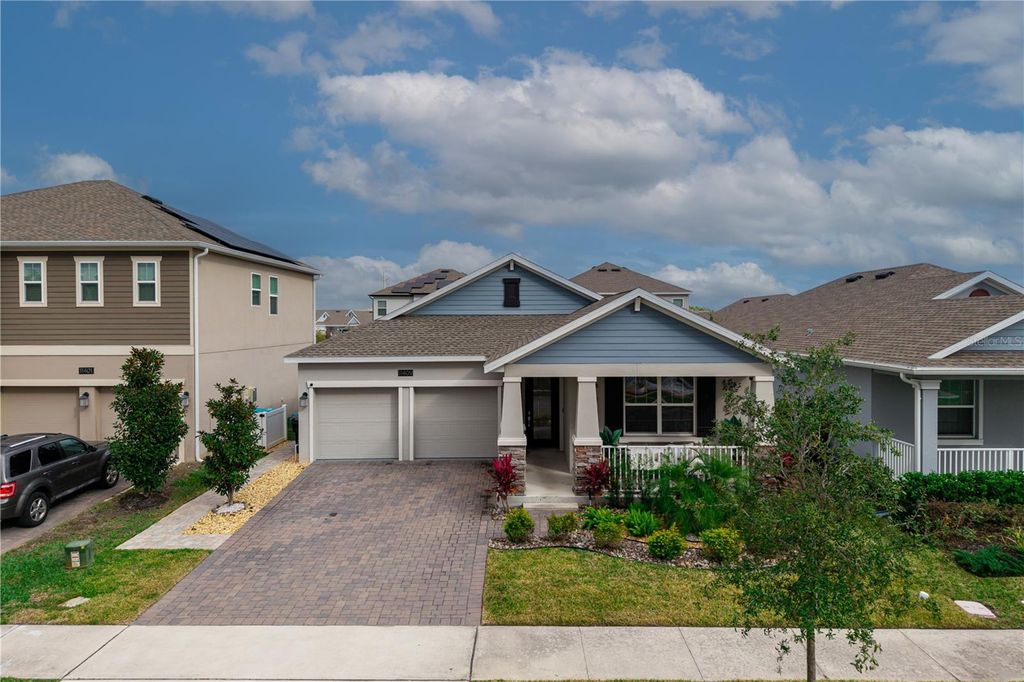 Photo of 11409 Rhyme Ave, Orlando, FL 32832 (MLS # S5140652)