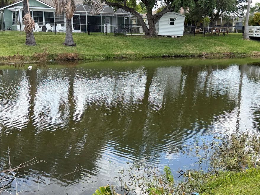 Discover the potential of this prime quarter-acre homesite located in desirable X flood zone, featuring western rear exposure and plenty of room for your new construction home with a 3-car garage and pool. Ideal for both end-users and builders looking to capitalize on a growing area. Positioned along the scenic Sunshine Canal, this property offers tranquil water views and excellent fishing right from your backyard—an increasingly sought-after feature for today’s buyers.

City water and sewer are already in place, with electricity nearby for a smooth and cost-effective build process. The lot is naturally wooded with mature Florida native trees, providing a private, picturesque setting while still offering flexibility for clearing and design.

Surrounded by newer, upscale homes, this location supports strong resale value and attractive build opportunities. Whether you're planning a custom waterfront residence or a spec home for investment, this parcel checks the right boxes. 

Conveniently located near shopping, dining, and healthcare, with easy access—approximately one hour north or south—to major international airports and Gulf Coast beaches.

Opportunities like this are limited—secure your place on the water and bring your vision to life.