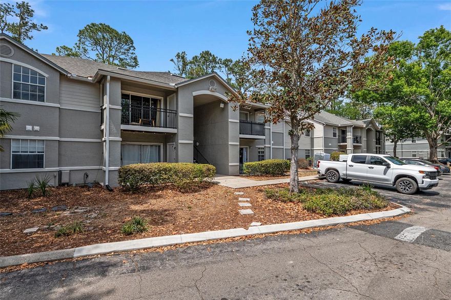 2 bed/2 bath condo near the University of Florida, UF Health Shands Hospital, and on the bus route to UF! This floor plan features a spacious living/dining room combo with a breakfast bar, plus a patio with a storage closet overlooking green space. The condo also includes 2 spacious bedrooms and 2 full bathrooms. Upgrades include laminate flooring throughout the living room and bedrooms, along with tile flooring in the bathrooms. This building is ideally located near the community pool and bus stop. Community amenities include a resort-style pool and spa, fitness center, basketball courts, and tennis courts. A covered bus stop to UF is located directly outside the community. Monthly association fees pay for exterior insurance, exterior maintenance, internet, and cable TV. MOVE-IN READY condo close to the VA, UF Health Shands Hospital, the University of Florida, and shopping!
