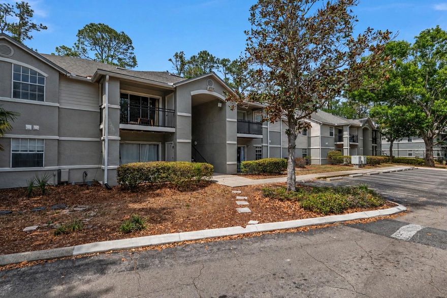 One or more photo(s) has been virtually staged. 2 bed/2 bath condo near the University of Florida, UF Health Shands Hospital, and on the bus route to UF! This floor plan features a spacious living/dining room combo with a breakfast bar, plus a patio with a storage closet overlooking green space. The condo also includes 2 spacious bedrooms and 2 full bathrooms. Upgrades include laminate flooring throughout the living room and bedrooms, along with tile flooring in the bathrooms. This building is ideally located near the community pool and bus stop. Community amenities include a resort-style pool and spa, fitness center, basketball courts, and tennis courts. A covered bus stop to UF is located directly outside the community. Monthly association fees pay for exterior insurance, exterior maintenance, internet, and cable TV. MOVE-IN READY condo close to the VA, UF Health Shands Hospital, the University of Florida, and shopping!