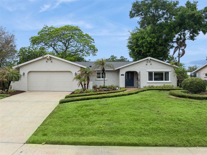 Welcome to this beautifully updated 3-bedroom, 2-bath home offering 1,735 sq. ft. in the highly sought-after Lake Shore Gardens/Sleepy Harbour community in Ocoee! Thoughtfully upgraded and move-in ready, this home combines modern improvements with a functional, open-concept layout ideal for everyday living and entertaining. Step inside to a light-filled interior featuring luxury vinyl flooring throughout and a seamless flow between the living room, dining area, and kitchen. The kitchen offers new stainless steel appliances (2026) and a breakfast bar, perfect for both casual meals and hosting guests. The split-bedroom floor plan provides added privacy, with a spacious primary suite offering two walk-in closets with plenty of storage space plus a private en suite bath with a large walk-in shower. The property also includes a versatile den/office that is ideal for remote work or flex space to suit your needs. Two additional bedrooms are located on the opposite side of the home. This home offers exceptional peace of mind with an extensive list of updates including: roof (2019), AC (2017, with UV lighting added in 2025), water heater (2026), replumb (2021), new windows (2024), bathroom renovation (2023), new attic insulation and duct maintenance/repairs for energy efficiency (2024), whole-house surge protector (2026), popcorn ceiling removal (2026), and new fans (2025). Situated on an expansive 0.27-acre lot with generous space between you and your neighbors, the property also features a screened patio overlooking a large, private fenced backyard—perfect for relaxing or entertaining outdoors. A standout feature is the 10x12 insulated she shed equipped with electricity and its own AC unit, offering an ideal space for a home office, studio, or hobby room. The 2-car garage also includes an electric vehicle charger for added convenience. Enjoy access to a private community park with a boat ramp to Starke Lake, making it easy to embrace Florida’s outdoor lifestyle. While being in a very peaceful neighborhood, it is conveniently located within walking distance to near shopping, dining, and major roadways including the Turnpike and 429, this home offers the perfect blend of comfort, style, and accessibility. Schedule your private showing today before it’s gone! *Aerial photo property lines are an estimate and to be verified by buyer.