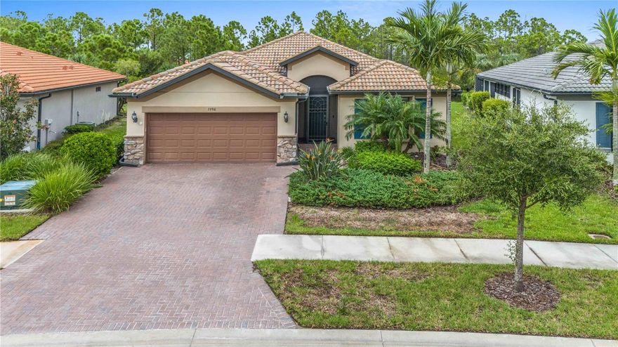 **ASSUMABLE 2.875% VA LOAN OPTION** POND • POOL • PRIVACY • NO FLOOD ZONE!! Step into a home that feels every bit as refined as a Del Webb model. Thoughtfully curated upgrades & nearly 2,000 sq. ft. of beautifully designed living space come together to create a residence that is both sophisticated & effortlessly comfortable. This highly sought-after Summerwood/Mystic large, open concept floor plan offers 3 bedrooms, 2 baths + a versatile den/flex room, allowing you to tailor the space to your lifestyle. The kitchen stands as the crown jewel of the home, captivating w/ its upgraded, exquisite white wood cabinetry (w/crown molding) & an enlarged, level 5 quartz counter-top center island w/ beautiful glass pendants above that invites gatherings & culinary creativity. NEWER Premium built in stainless appliances gleam beneath a striking decorative wood range hood & cooktop, while the mesmerizing icicle glass backsplash & under cabinet lighting adds a touch of sparkle & sophistication. Every detail has been carefully curated to create a tranquil retreat that elevates your everyday living experience. Step into the refined owner’s suite (brand new carpet), w/ a beautiful view of the pond & preserve—a sanctuary designed for ultimate relaxation! The private en-suite bathroom features a resort-style walk-in shower w/ upscale finishes, built in shower seat & convenient grab bars. There is also a sleek dual sink vanity, a discreet water closet & a roomy linen closet for added storage. The upgraded faucets & fixtures lend a modern touch, while the expansive walk-in closet, outfitted w/ added shelving, invites you to organize your wardrobe w/ ease. At the front of the home, a beautifully appointed guest bedroom & an additional full bath provide comfort & privacy for visitors. The versatile den or office are complemented by French doors, creating a peaceful space for work or relaxation, while the third bedroom offers flexibility for a variety of uses. The thoughtfully designed interior utility room features an LG premium washer & dryer, w/ added shelving above providing the perfect space for all your laundry essentials, keeping everything tidy & within easy reach! A custom salt water heated pool & an extended lanai anchors the outdoor living space, overlooking a shimmering pond & protected preserve—ensuring your views remain forever untouched. Zero-degree sliders blur the line between indoors & out, filling the home w/ natural light & creating a breezy & open ambiance. Remote roll-down fabric hurricane screens on the lanai serve as wind & rain guards, while slider protection covers smaller windows & accordion shutters protect all others. Even the garage has been elevated w/ a 4-foot extension & epoxy flake flooring. Additional upgrades include hurricane shutters, custom Hunter Douglas window treatments, smart home features w/ a wireless access point, voice controls & a smart garage! A full upgrade list attached in the MLS! Cypress Falls offers an unparalleled lifestyle w/ resort-style amenities: a resistance pool, beach-entry pool, spa, pickleball & tennis courts, bocce, billiards, ping pong, horseshoes, library, internet café & an impressive array of clubs and classes—from yoga & tai chi to mah jong, bridge, poker, dance & more. Social events, entertainment & community gatherings create a vibrant, welcoming atmosphere. This residence is more than a home—it is a refined retreat for those seeking elegance, connection & the beauty of waterfront living.