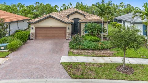 Photo of 1596 Hyssop Loop, North Port, FL 34289 (MLS # C7524100)