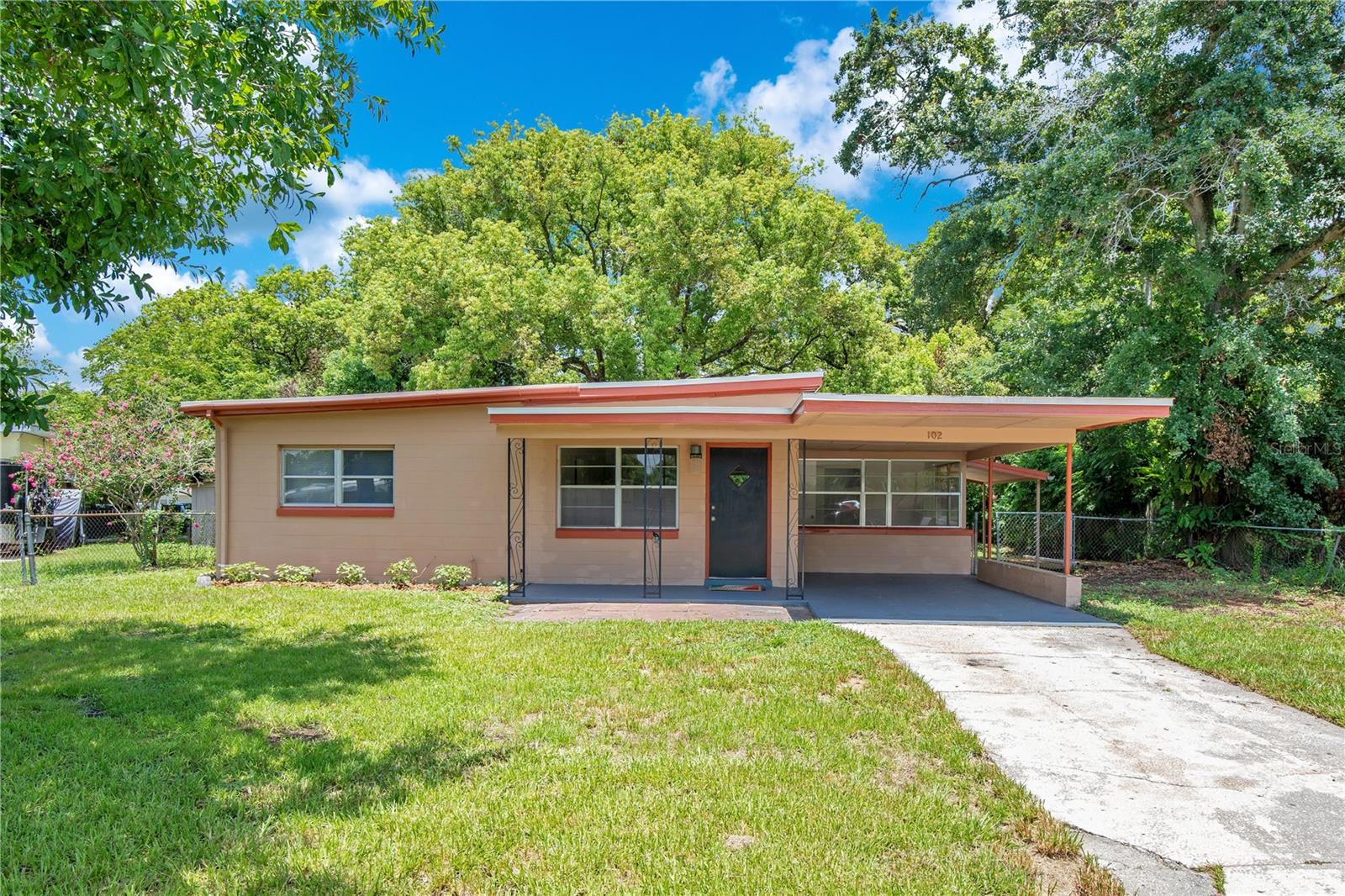 Charming Florida Ranch One-Story Block Home Ready for its New Owner! This Move In Ready Home has a Welcoming Covered Front Porch Steps from the Carport. Tiled Throughout the Main Living Areas - Offering Durability and Easy Maintenance. Open Floorplan Makes for Easy Living. Updated Kitchen with Stainless Appliances, Granite Counter Tops and Plenty of Cabinet Space. This Home offers Two Carpeted Bedrooms Each with Ceiling Fans. An Updated Hall Bath with Walk-In Shower and Modern Vanity. Off the Living Room the Florida Room Gives Additional Living Space and Access to the Carport and Side Yard. Step Outside to the Oversized Fenced Backyard Ideal for Gardening, Playing Cornhole or Throwing the Frisbee with Your Dog. A Storage Shed in Backyard for Storing Yard Equipment. Conveniently Located to Major Highways, Shopping and Restaurants. Easy Access to Downtown Historic Sanford Known for its Restaurants, Breweries and Unique Shops. Updates Include Roof (2020) and AC (2021) for Peace of Mind. Come Take a Look Today!