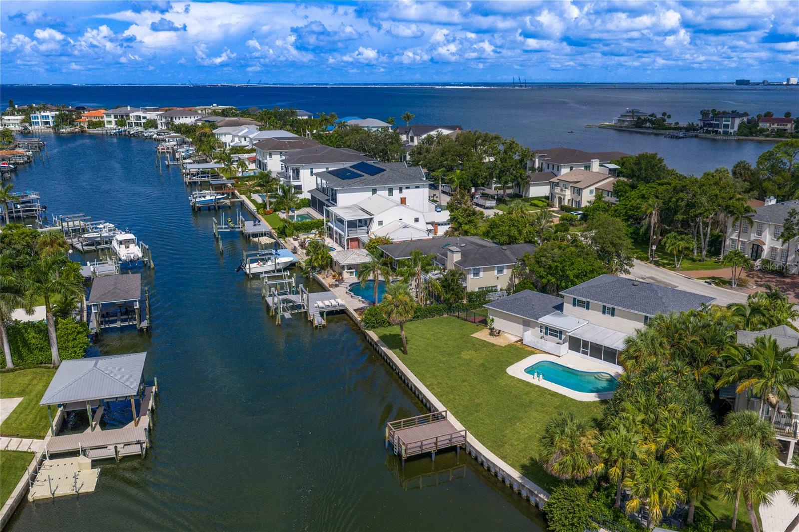 One or more photo(s) has been virtually staged. Available for Lease! Fully renovated waterfront pool home on John Branch saltwater canal, featuring direct access to Old Tampa Bay with the Gulf Coast beaches beckoning a short distance away. This like-new Sunset Park Isles 4-bedroom, 2 full bath/2 half bath beauty, on a .30-acre lot with fenced backyard and an incredible 122’ of water frontage, is move-in ready. Every detail has been carefully crafted, as this home features top-rated GE and LG appliances, brand new gorgeous wood-look LVP flooring, beautiful kitchen and bathroom cabinetry, energy efficient double-pane windows, incredible water views featured throughout the home, inviting saltwater pool, huge backyard perfect for entertaining and outdoor living, and stunning water views off the newer boat dock (2019). Ideal for kayaking, paddle boarding, boating, and enjoying a morning or evening beverage, this waterfront oasis provides a perfect blend of indoor and outdoor living on one of the most coveted streets in all South Tampa.
Additional features include: new roof (2025), newer seawall (2018), new GE dishwasher/microwave/stovetop/oven (2025), new Maytag washer and dryer (2025), energy efficient HVAC system, underground power lines, stylish light fixtures and fans, and new tropical landscaping and sod in front and back yards.
Sunset Park Isles is one of the most desirable neighborhoods in South Tampa, zoned for top-rated Mabry/Coleman/Plant public schools, also offering convenient access to the area’s best private schools, hospitals, premier shopping & dining, TPA Airport, Downtown Tampa, Downtown St. Pete, Pinellas beaches and golf courses, and much more! Schedule your showing today and live the waterfront lifestyle!
Measurements and dimensions are estimates. Tenant’s agent to verify all measurements. Tenant pays utilities including electric, water/sewer and cable/wifi. Landlord pays lawn maintenance, pest control and pool maintenance.
