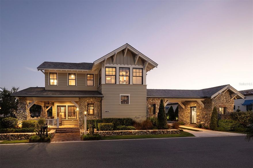 Overlooking cozy Lullaby Park sits this enchanting cottage awaiting your discovery. Distinctive Craftsman architecture with beautiful stone accents sets a welcoming tone for this picture-perfect haven. Upon entry from the two-sided covered porch, discover the open great room accented with custom ceiling beams and intricate custom carpentry features. The gourmet kitchen is sure to delight with a distinctive granite island, hidden pantry cabinetry, and a LaCornue gas range. For the ultimate in relaxation, the elegant owner’s suite boasts a spacious ensuite bath with a freestanding, copper-finish tub. Guests alike will relish the two whimsical, Disney-themed guest suites and a quaint loft area with bunks. For a seamless indoor-outdoor lifestyle, the generous outdoor living space features a summer kitchen overlooking the relaxing pool and spa. Golden Oak at Walt Disney World Resort(R) is a residential resort community where families can live in the embrace of luxury, privacy, and the magic of Disney. This gated community features distinctive neighborhoods of magnificent homes, expansive natural preserves, and inviting amenities - including access to Golden Oak's private clubhouse, Summerhouse, with superb food offerings served in a casually elegant dining room, courtyards, pool area, fitness facilities, and family room. In addition, residents have access to Club Life, Your Special Connection to the Magic , including access to the Golden Oak Member Services team, park transportation, signature club events, theme park experiences, and much, much more. Also at Golden Oak is the Four Seasons Resort Orlando at Walt Disney World Resort, which hosts and 18-hole Tranquilo golf course, full-service spa, meeting facilities, and superlative restaurants