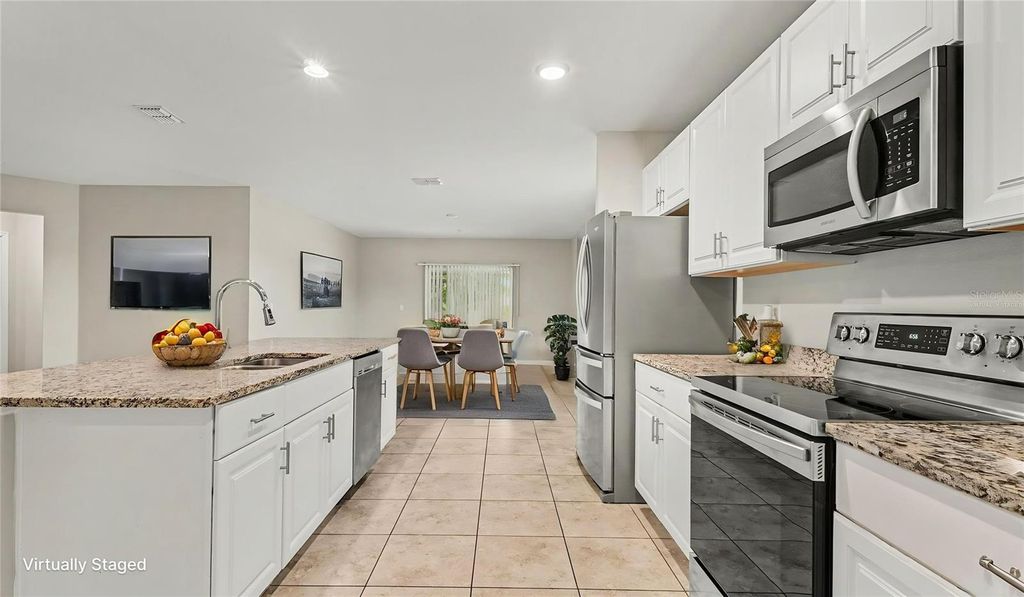 Photo of 3381 SW 129th Loop, Ocala, FL 34473 (MLS # O6401170)