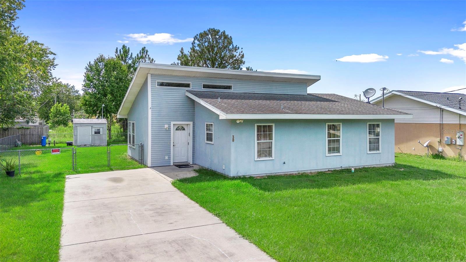 Welcome to this charming home in the desirable Silver Springs Shores community of Ocala, FL! Built in 2001, this well-maintained 3-bedroom, 2-bathroom residence is move-in ready and offers a warm, inviting design with abundant natural light and functional living space.
Inside, you’ll find an open living area with vaulted ceilings, skylights, ceiling fans, and laminate flooring that create a bright and spacious atmosphere. The kitchen features ample cabinetry, a breakfast bar, and generous counter space—perfect for both everyday living and entertaining. The primary bedroom offers a walk-in closet and en-suite bath, while the additional bedrooms provide flexibility for family, guests, or a home office. The laundry area is conveniently located at the end of the kitchen near the windows.
Step outside to enjoy the Florida lifestyle with a covered, screened-in lanai overlooking the fully fenced backyard. A storage shed and plenty of yard space make this property ideal for gardening, pets, or outdoor activities.
Sitting on a 0.23-acre lot with no HOA and no deed restrictions, this home combines privacy and convenience, all within close proximity to schools, shopping, dining, and just a short drive to Downtown Ocala. Don’t miss your chance to make this home yours—schedule your private tour today!
