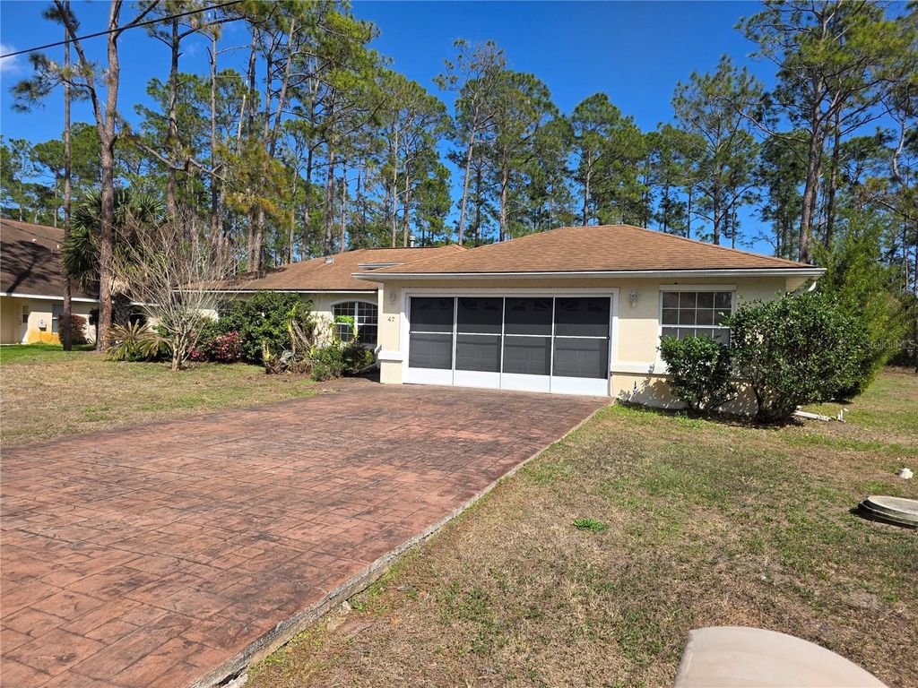 Photo of 47 Rippling Brook Drive, Palm Coast, FL 32164 (MLS # FC316186)