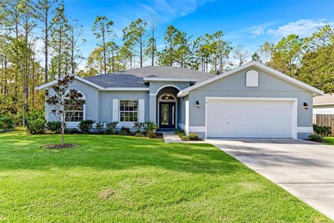 Photo of 9 Port Royal Drive, Palm Coast, FL 32164 (MLS # FC310382) Photo of 9 Port Royal Drive, Palm Coast, FL 32164 (MLS # FC310382)