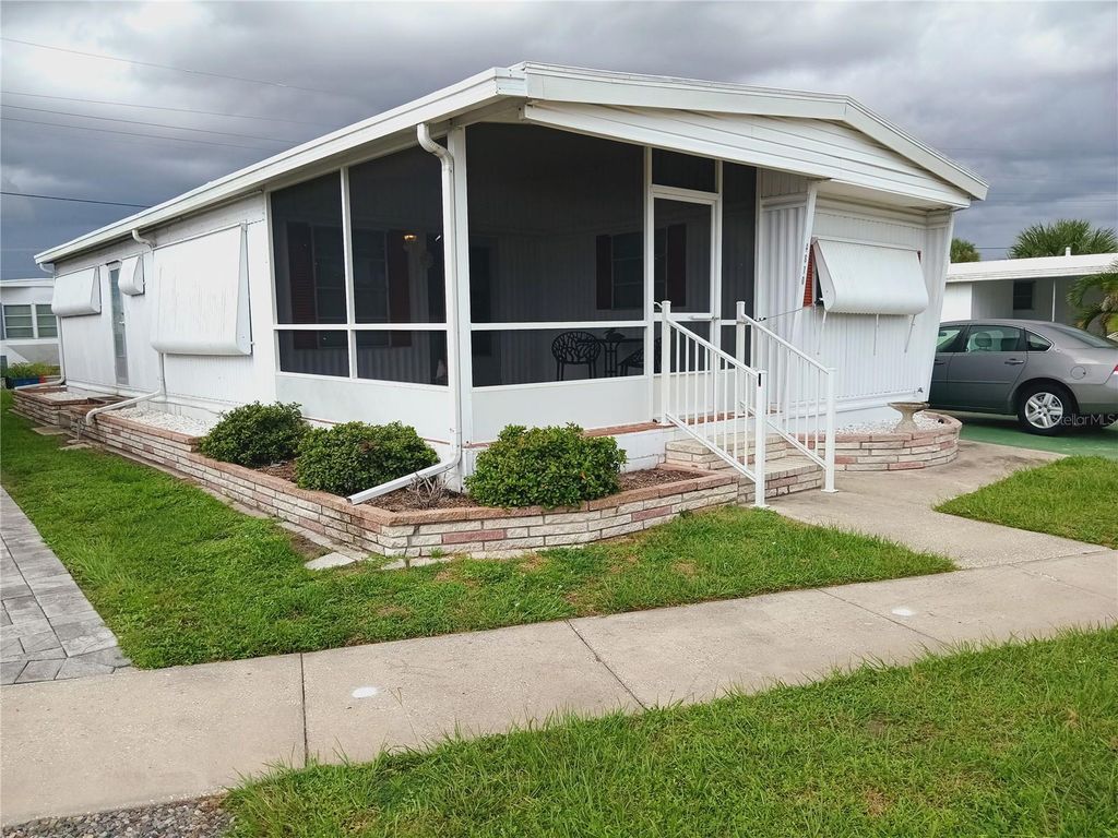 Photo of 4810 Tri Par Drive, Sarasota, FL 34234 (MLS # A4665478)