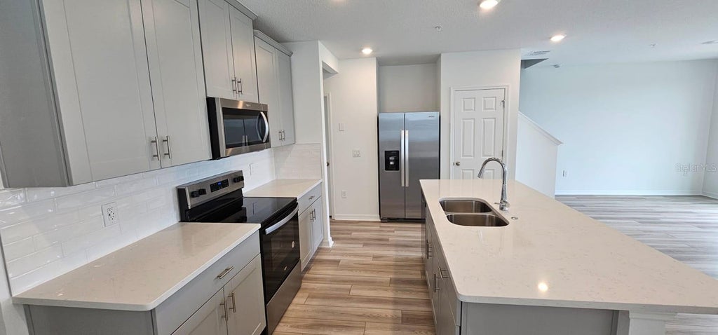 Photo of 2110 Crape Jasmine Lane, Orlando, FL 32824 (MLS # S5158597)