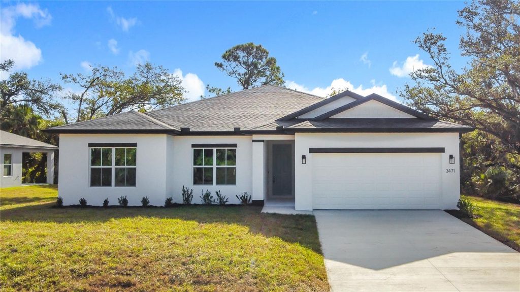 Photo of 3471 Henderson Lane, North Port, FL 34286 (MLS # OM714909)