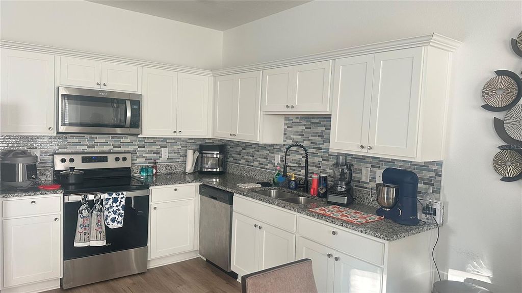 Photo of 453 Madison Drive, Davenport, FL 33837 (MLS # TB8447477)