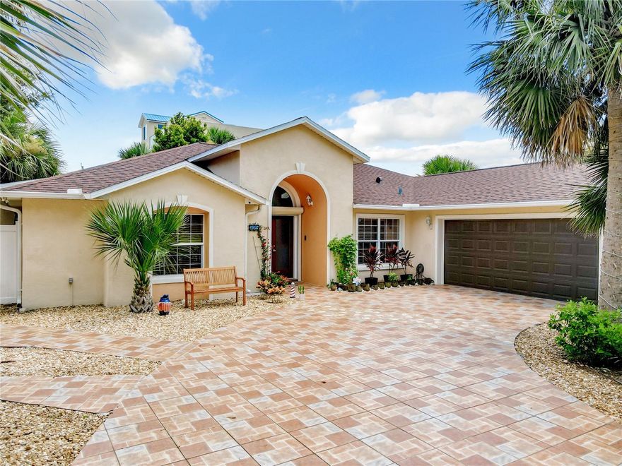 This is an amazing opportunity to own a Beachside home in the highly sought after, Flagler Beach, Priced to sell!! Located on a double lot, just 3 blocks from the ocean. 3 bedroom, 2 bath with over 2,300 sqft, expansive living space with its modern updated kitchen and skylights through out the home providing lots of natural light! The kitchen offers granite countertops, stainless steel appliances, wooden cabinets, and an island bar. New Porcelain tile flooring through out the home, with additional luxury laminate flooring in family room. Updated primary bedroom with an en suite bathroom including a garden tub, standalone shower, and a large custom-built walk-in closet. This home offers a bonus room, presently serving as an office. Warm and welcoming living room with many additional cozy spaces through the home. Many additional updated through out the home, must see! Impact, double- paned Windows. 2021 roof. The AC/handler and 50- gallon hot water tank installed 2023. A full house Predator 9000 generator conveys with the sale ensuring power at all times. Large driveway and oversized garage with non-skid paver tile. A storage shed with electricity can easily be used for golf cart storage as well. New 2023 perimeter fence surrounding the entire premises. Motion detector security lighting surrounds the home and garage. Ample space for boat or RV parking.