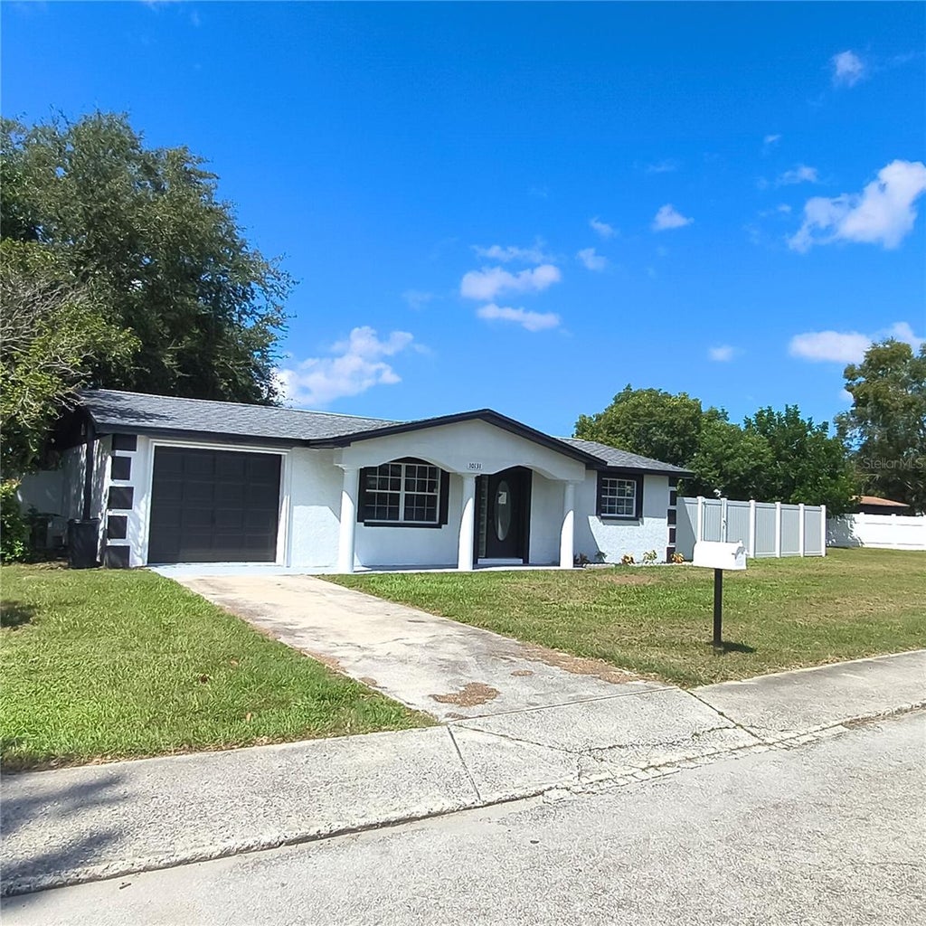 Photo of 10131 Old Orchard Lane, Port Richey, FL 34668 (MLS # TB8557215)