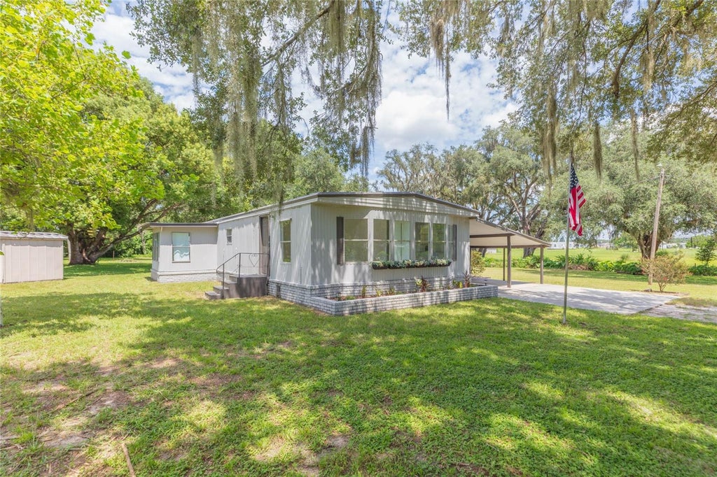 Photo of 4211 Lowell Lane, Zephyrhills, FL 33541 (MLS # TB8542806)